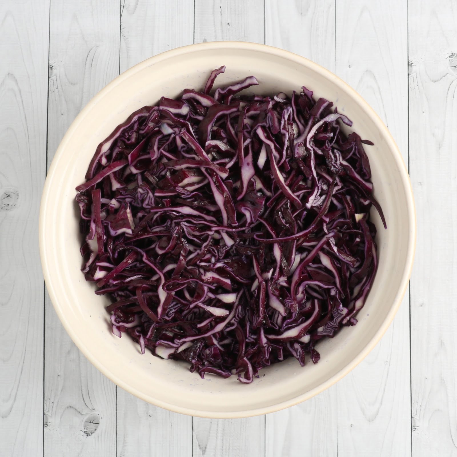 spiced red cabbage canning recipe salting the shredded cabbage